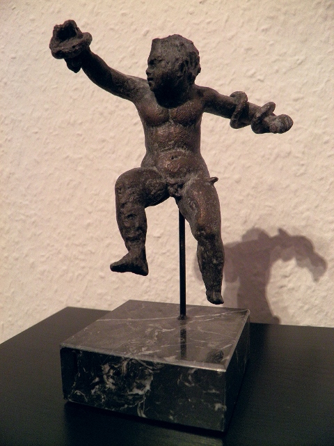 He's naked, but it's okay because it's art.